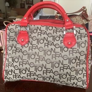 Kenneth Cole reaction purse, brown with red handles and trip
